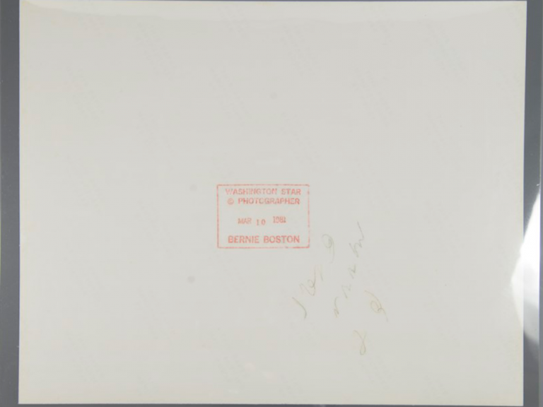 back of photograph with stamp
